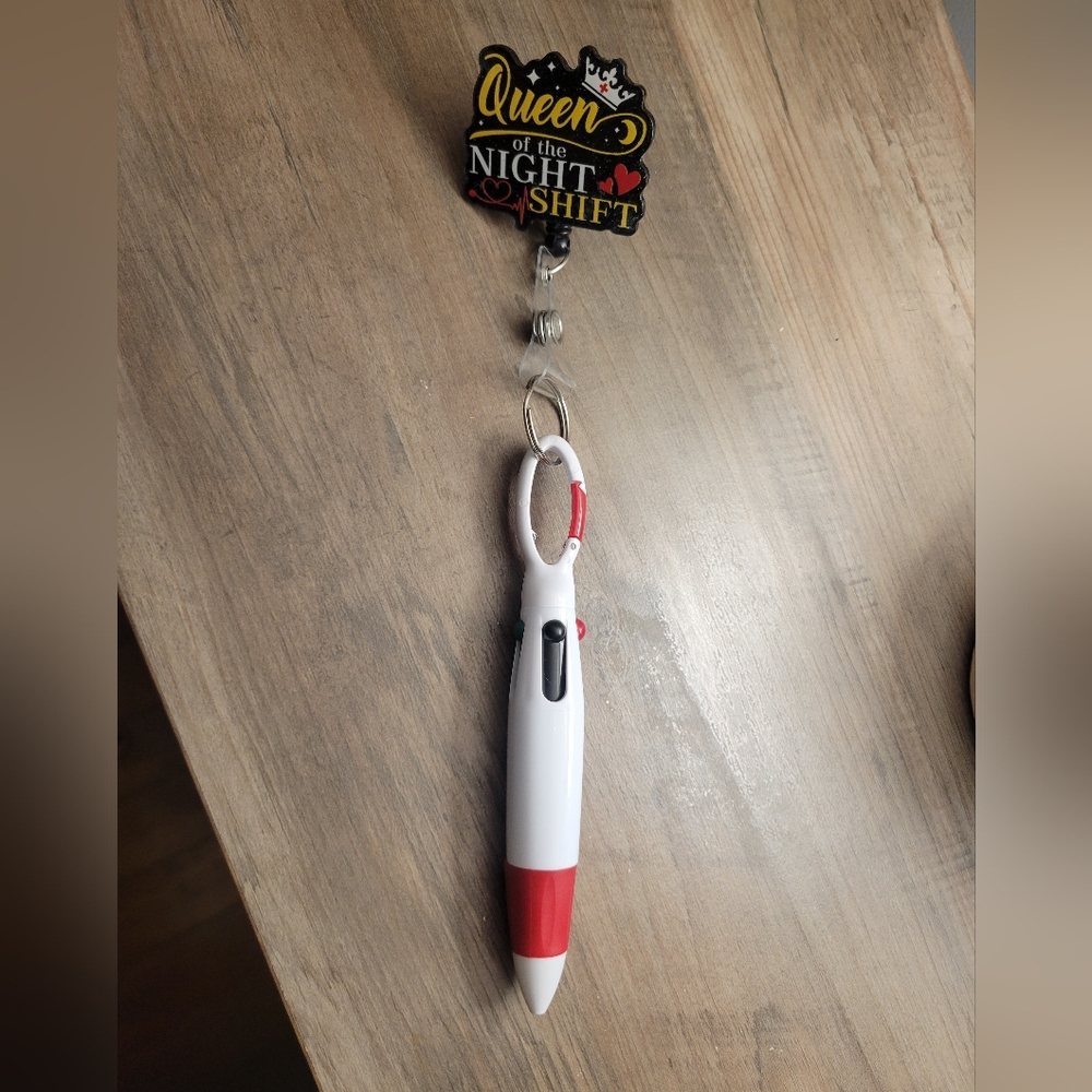 Nurse Badge and a multicolored pen
